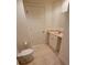 Bathroom featuring a toilet, vanity and tile flooring at 1771 Ringling Blvd # 902, Sarasota, FL 34236