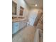 Bright bathroom featuring a double vanity, shower and tub at 1771 Ringling Blvd # 902, Sarasota, FL 34236
