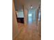 Bright entryway with tile floors leading to an open living space and views at 1771 Ringling Blvd # 902, Sarasota, FL 34236