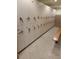 A locker room with storage and bench at 1771 Ringling Blvd # 902, Sarasota, FL 34236