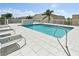A outdoor pool with lounge chairs at 1771 Ringling Blvd # 902, Sarasota, FL 34236