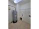A utility room with water heater at 1771 Ringling Blvd # 902, Sarasota, FL 34236