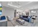 Bright open concept featuring kitchen, dining, and living rooms at 18010 Harwich Pl, Lakewood Ranch, FL 34202