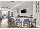 Elegant bar area with stylish seating, perfect for entertaining guests at the clubhouse at 18032 Polo Trl, Bradenton, FL 34211