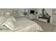 Bedroom with view, bright light, and stylish linens at 18032 Polo Trl, Bradenton, FL 34211