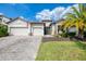 Stunning two-story home featuring a paver driveway and a two-car garage at 18032 Polo Trl, Bradenton, FL 34211
