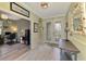 Spacious foyer with tiled floors and a view of a study at 18032 Polo Trl, Bradenton, FL 34211
