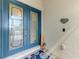 Elegant front door with glass detailing and welcoming decor at 18032 Polo Trl, Bradenton, FL 34211