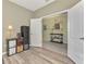 This is an office featuring neutral walls, decorative accents, and view into another room at 18032 Polo Trl, Bradenton, FL 34211