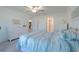 Bedroom boasts neutral walls, plush carpet, ensuite bathroom, and walk-in closet for ample storage at 22111 Nebula Way, Land O Lakes, FL 34637