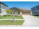 Charming single-Gathering home featuring a well-manicured lawn and a two car garage at 22111 Nebula Way, Land O Lakes, FL 34637