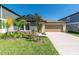 Charming single-Gathering home featuring a well-manicured lawn and a two car garage at 22111 Nebula Way, Land O Lakes, FL 34637