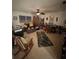 Cozy living room with comfortable seating, a functional workspace, and ample storage, perfect for relaxing and productivity at 227 Golden Harbour Trail Way, Bradenton, FL 34212