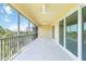 Screened patio with tile floors and a beautiful view at 280 Hidden Bay Dr # 202, Osprey, FL 34229