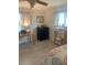 Bedroom featuring neutral walls, dark furniture, and wood-look flooring at 3013 Yarmouth W Dr, Bradenton, FL 34205