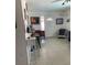 A tiled entryway featuring a wine rack and a quaint bar setup at 3013 Yarmouth W Dr, Bradenton, FL 34205