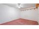 Cozy bedroom featuring carpet flooring, ceiling fan, and ample space, perfect for relaxation at 333 Springdale Dr # 333, Bradenton, FL 34210