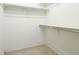 Bright closet featuring built-in shelving, offering ample storage space for organization at 333 Springdale Dr # 333, Bradenton, FL 34210