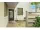 Private entrance with a decorative textured walkway at 333 Springdale Dr # 333, Bradenton, FL 34210