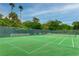 Enjoy a game on this pristine tennis court surrounded by lush tropical landscaping and comfortable courtside seating at 333 Springdale Dr # 333, Bradenton, FL 34210