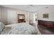This bedroom features wood floors, ensuite bath, and a large closet at 3512 21St W Ave, Bradenton, FL 34205