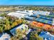 Aerial view showcases property near tennis courts and parking at 3608 54Th W Dr # 102, Bradenton, FL 34210