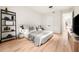 Tastefully decorated bedroom with modern lighting fixtures and minimalist furnishings at 3608 54Th W Dr # 102, Bradenton, FL 34210