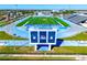 Aerial view of IMG Academy's football field and track, highlighting sports excellence and quality facilities at 3608 54Th W Dr # 102, Bradenton, FL 34210