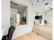 Hallway leading to the living room with glass doors to the bedroom at 3608 54Th W Dr # 102, Bradenton, FL 34210