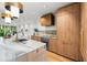 Contemporary kitchen with open floor plan, modern appliances, and an eat-in island at 3608 54Th W Dr # 102, Bradenton, FL 34210