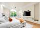 A window provides ample natural light in this main bedroom, which includes a TV at 3608 54Th W Dr # 102, Bradenton, FL 34210