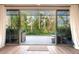 Outdoor patio with wicker furniture and beautiful nature views at 3608 54Th W Dr # 102, Bradenton, FL 34210