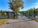 Secure entrance to a paved walking path with a serene view, enhancing community charm and inviting exploration at 3608 54Th W Dr # 102, Bradenton, FL 34210