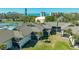 Aerial view of the community featuring a pool and tennis courts at 4234 Gulf Of Mexico Dr # Q2, Longboat Key, FL 34228