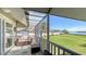 Relaxing screened-in lanai with charming water views and comfortable seating at 4234 Gulf Of Mexico Dr # Q2, Longboat Key, FL 34228