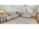 Inviting living room featuring a neutral color palette, plush seating, and an open layout to the kitchen at 4234 Gulf Of Mexico Dr # Q2, Longboat Key, FL 34228