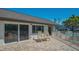 Brick patio with lounge chairs beside a pool and tropical landscaping at 4234 Gulf Of Mexico Dr # Q2, Longboat Key, FL 34228