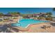 Sparkling community pool with seating areas and lush landscaping near condos at 4234 Gulf Of Mexico Dr # Q2, Longboat Key, FL 34228