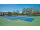 Community tennis courts for residents' enjoyment and recreation at 4234 Gulf Of Mexico Dr # Q2, Longboat Key, FL 34228