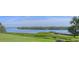 Picturesque water views, lush greenery, and an American flag blowing in the breeze at 4234 Gulf Of Mexico Dr # Q2, Longboat Key, FL 34228
