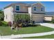 Charming two-story home with well-maintained lawn, two car garage and beautiful landscaping at 4509 Halls Mill Xing, Ellenton, FL 34222