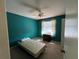 Comfortable bedroom with a ceiling fan, window, and neutral carpet at 5011 Barrington Cir # 101, Sarasota, FL 34234