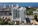 Modern luxury building with views of the water and surrounding city at 540 N Tamiami Trl # 1503, Sarasota, FL 34236