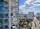 Modern condo building featuring private balconies with city views and outdoor seating at 540 N Tamiami Trl # 1503, Sarasota, FL 34236