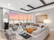 Bright and stylish living room features floor-to-ceiling windows with picturesque water views at 540 N Tamiami Trl # 1503, Sarasota, FL 34236