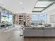 Modern living area with floor-to-ceiling windows and scenic ocean views at 540 N Tamiami Trl # 1503, Sarasota, FL 34236