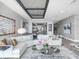 Bright living room with gray walls, white sectional sofa and unique ceiling design at 540 N Tamiami Trl # 1503, Sarasota, FL 34236
