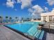 Enjoy the rooftop pool with inviting lounge seating and breathtaking city views at 540 N Tamiami Trl # 1503, Sarasota, FL 34236