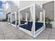 Chic rooftop lounge area with stylish cabanas, perfect for relaxing and enjoying the views at 540 N Tamiami Trl # 1503, Sarasota, FL 34236
