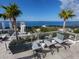 Enjoy the rooftop seating area with water views for relaxing or entertaining guests at 540 N Tamiami Trl # 1503, Sarasota, FL 34236